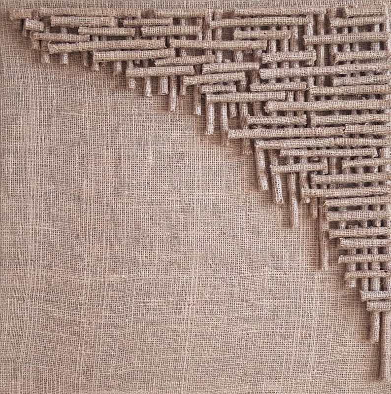 Illustration of Brown Woven Fabric Wall Hanging