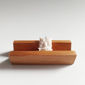 Bear eating salmon carved bone pendant, handmade bone carving