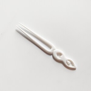 Bone hair stick 2 Prong , carved praying woman  bone hair fork