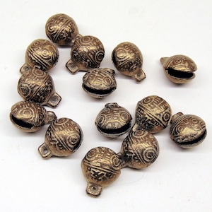 Solid Brass Bells 12 pieces  ~ Heavy duty  24mm H x 20mm W ( 1" x 3/4")   Great Sound ! Tibetan Style   Embossed Tiger Face