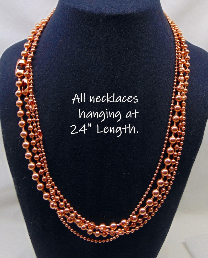 Juego de collar de 4 cadenas de bolas de cobre. Todas de 24" de largo. El tamaño de las bolas aumenta de 2,4 mm a 3,2 mm, a 4,5 mm y a 6,3 mm. Producto de EE. UU. 99,97 % puro. Sin níquel. imagen 5