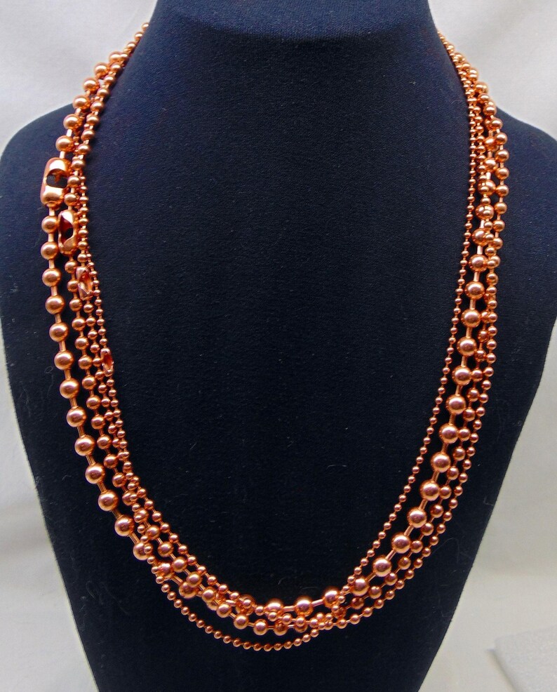 Juego de collar de 4 cadenas de bolas de cobre. Todas de 24" de largo. El tamaño de las bolas aumenta de 2,4 mm a 3,2 mm, a 4,5 mm y a 6,3 mm. Producto de EE. UU. 99,97 % puro. Sin níquel. imagen 6