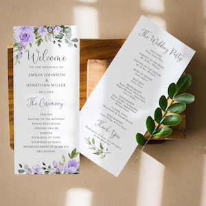 May include: Two wedding programs with floral designs and text. One program says "Welcome" and lists the couple's names and ceremony details. The other lists the wedding party and a thank you message.