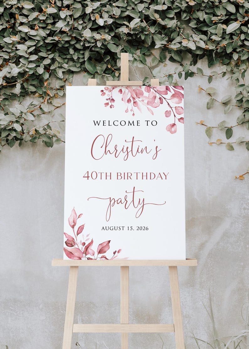 May include: Welcome to Christin's 40th Birthday party, 15 August 2026. A white sign with pink floral watercolour design.