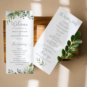 May include: Two wedding programs with elegant calligraphy and botanical accents. One program reads "Welcome" and lists the couple's names and wedding date. The other lists the wedding party and a thank you message.