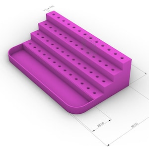 May include: A magenta-colored tiered organizer with multiple rows of small holes, likely for holding items. The design includes a rectangular base with a curved edge and a series of stepped platforms. Dimensions are indicated with lines and numbers.