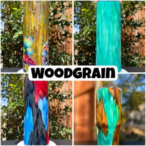 May include: Four tumblers with woodgrain designs. One has a yellow woodgrain with a butterfly and mushroom design. Another is teal, and the third has red, blue, and black streaks. The last one has a teal and brown woodgrain design. The word "WOODGRAIN" is in the centre.