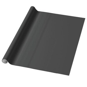 May include: A roll of black craft paper. The paper is rolled up and the end is visible.