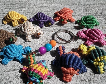 Custom Mini macrame turtles in various colors can be keyrings, magnets or charms for purses, zippers or bracelets.