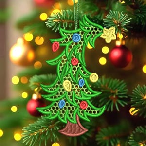 May include: A green embroidered Christmas tree decoration with colourful lights and a yellow star. The decoration is suspended on a Christmas tree with red and gold baubles in the background. The tree has green needles and yellow lights.