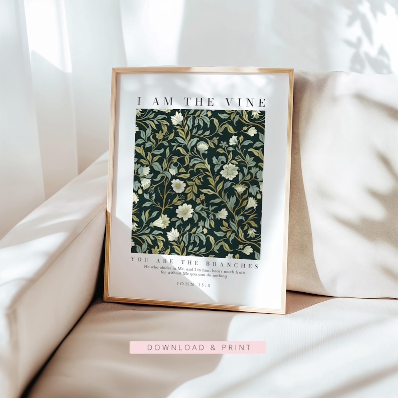 May include: Framed art print with the text "I AM THE VINE" and "YOU ARE THE BRANCHES". The artwork features a dark green background with a floral pattern in white, cream, and gold. The frame is a light wood color. The words "DOWNLOAD & PRINT" are at the bottom.