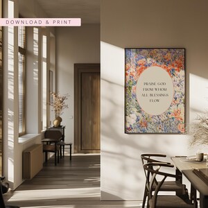 May include: A rectangular wall art print featuring a vibrant floral background in shades of blue, orange, and white. A central oval contains the black text: PRAISE GOD FROM WHOM ALL BLESSINGS FLOW. The artwork is displayed in a thin black frame.