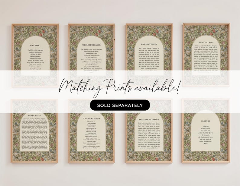 May include: Eight rectangular wall art prints in light wood frames, each featuring a central arch containing religious text against a detailed floral background with green leaves and red flowers. The text includes Hail Mary, The Lord's Prayer, and others.