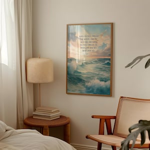 May include: A framed art print depicting a seascape with turbulent waves beneath a sky filled with clouds. The artwork includes the text "WHEN YOU PASS THROUGH THE WATERS, I WILL BE WITH YOU AND WHEN YOU PASS THROUGH THE RIVERS, THEY WILL NOT SWEEP OVER YOU."