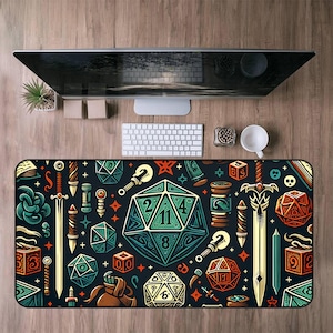 May include: A black desk mat featuring a colorful, illustrated design of dice, swords, and other fantasy game elements. The mat has a rectangular shape and is placed on a wooden desk with a computer monitor, keyboard, and other office supplies.