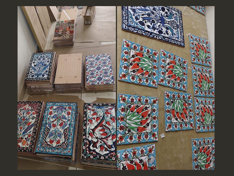 May include: Assortment of colorful ceramic tiles with floral patterns. The tiles are arranged in rows on a light blue surface. Some tiles feature a blue and white floral design, while others feature a red and green floral design.