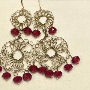 Sevilla - Stylish chandelier earrings with deep red trip glass rondelles.