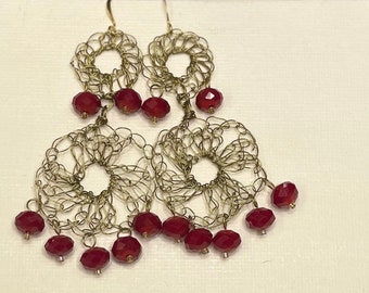 Sevilla - Stylish chandelier earrings with deep red trip glass rondelles.