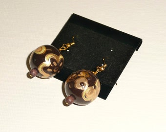 Rococo. Hand painted wood bead earrings in brown and gold tones.