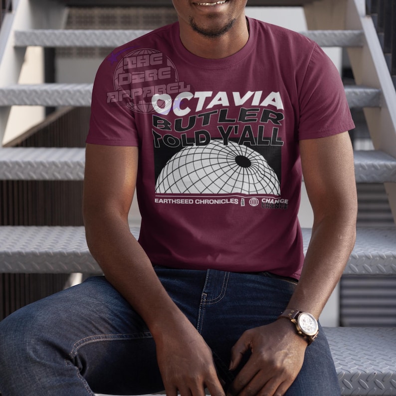 a streetwear inspired graphic tee shirt that reads Octavia Butler Told Y'all