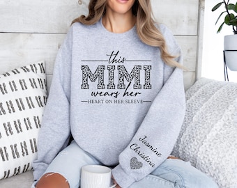 Custom This Mimi Wears Her Heart On Her Sleeve Sweatshirt, Mimi Heart Hoodie, Mother's Day Gift, Shirt with Names On Sleeve
