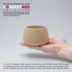 May include: A light brown plaster mold for slip casting clay. The mold is shaped like a small cup or bowl. The mold is being held in a hand. The text "Concept RED" is visible in the image.