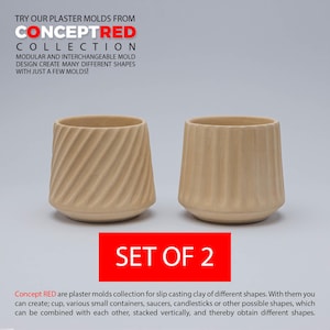 May include: Set of two beige plaster moulds for slip casting clay. The moulds are designed to create cups, containers, saucers, candlesticks, and other shapes. "Concept RED" and "Collection" are printed in red on a white background.