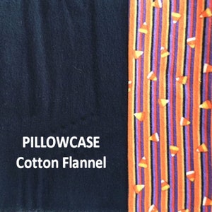 May include: A pillowcase made of cotton flannel. The left side is solid navy blue. The right side features vertical stripes in orange, purple, and black, with scattered candy corn designs. The text "PILLOWCASE Cotton Flannel" is displayed.