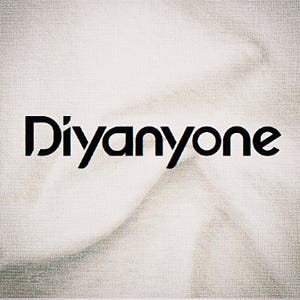 May include: The word "Diyanyone" in a bold, black sans-serif font is centered on a white, textured background. The background has subtle, blurred gray shading, creating a soft, abstract effect. The overall aesthetic is clean and modern.