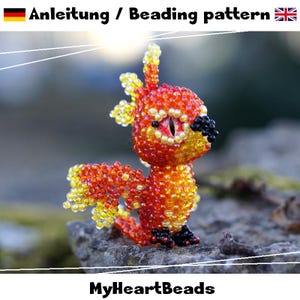 May include: A beaded phoenix figurine in shades of red, orange, and yellow. The bird has a detailed eye and black accents on its beak and feet. The text "Anleitung / Beading pattern" is at the top, and "MyHeartBeads" is at the bottom.