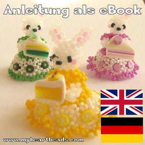 May include: Three beaded bunny figurines, each holding a slice of cake. The bunnies wear dresses in green, pink, and yellow, with white beaded bodies and pink ears. The image includes the text "Anleitung als eBook" and the website address.