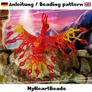 May include: A beaded phoenix sculpture crafted from vibrant red and yellow glass beads, featuring an intricate wing span and a long, flowing tail. The text "Anleitung / Beading pattern" and "MyHeartBeads" is visible on the image.