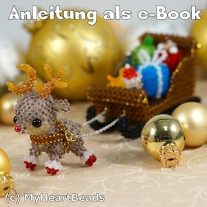 May include: A beaded reindeer pulling a sleigh filled with beaded gifts. The reindeer is brown and white with gold antlers. The sleigh is brown with a black base. The gifts are wrapped in various colours of blue, red, and green. The background is a light brown surface with gold ornaments.