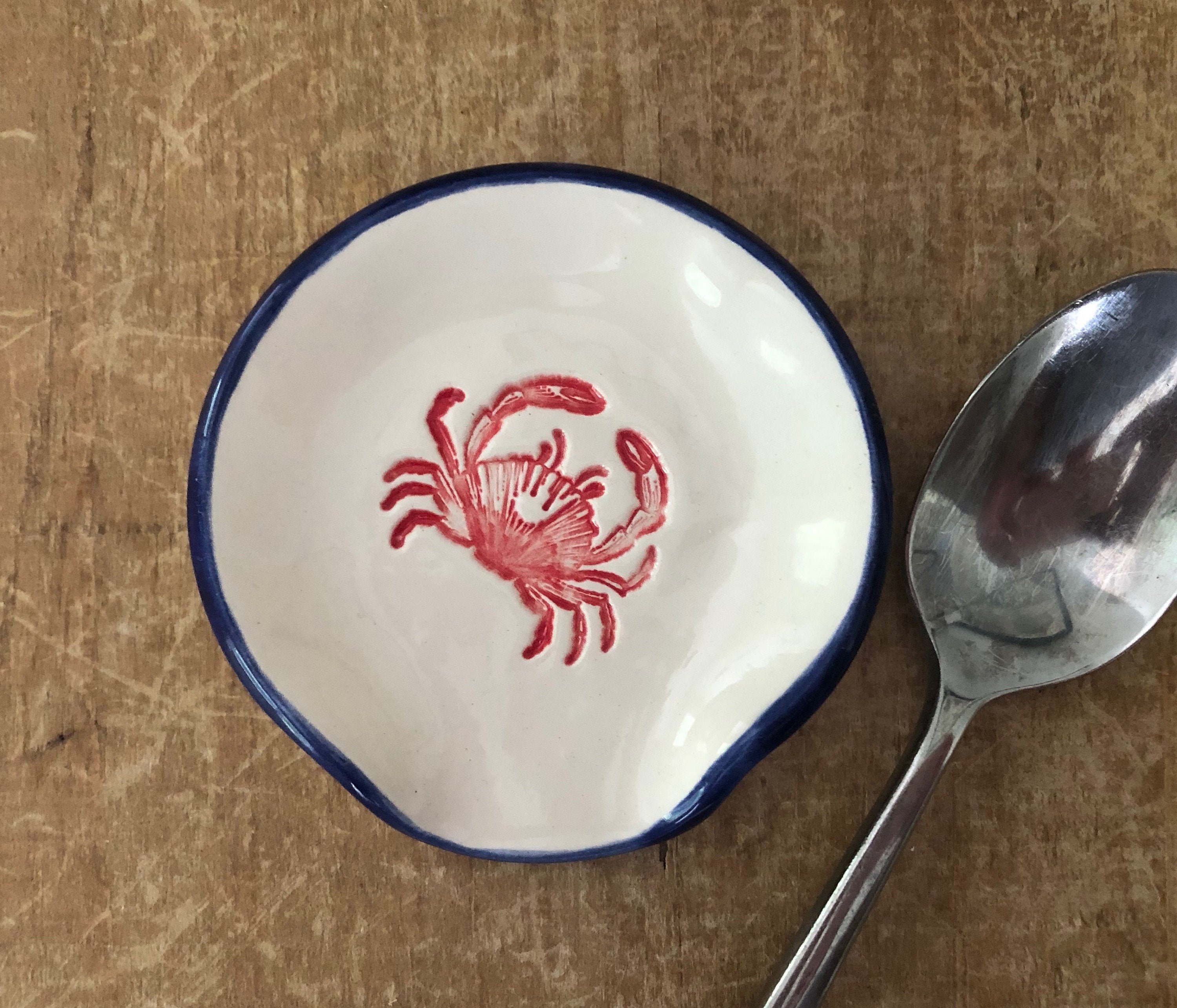 Crab spoon rest brings the beach to your stove top. Handmade by