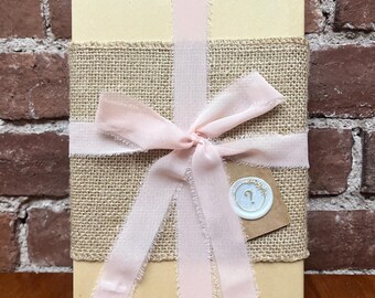 Blind Date with a Book | Sustainably Wrapped with Chiffon Pink Ribbon | Gently Loved Books