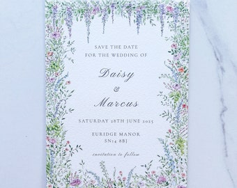 May include: Save the date card with a floral border. The card says "Save the Date for the Wedding of Daisy & Marcus, Saturday 28th June 2025, Euridge Manor, SN14 8BJ, Invitation to follow."