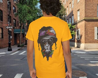 May include: A yellow t-shirt with a graphic print of a cat wearing a hat and sunglasses. The cat is holding a cigarette in its mouth.