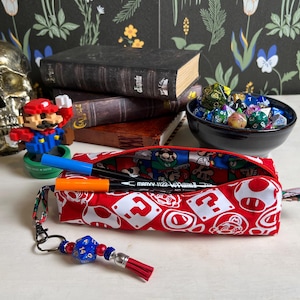 Petit sac à fermeture éclair inspiré de Mario & Luigi