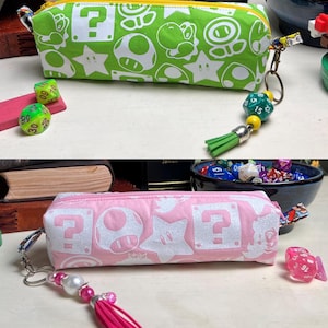 Petits sacs à fermeture éclair inspirés de la princesse Peach & Yoshi
