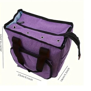 May include: A purple tote bag with black straps and a zipper closure. The bag has a small pocket on the front and measures 26cm/10.2 inches tall, 23cm/9.1 inches wide, and 14cm/5.5 inches deep.