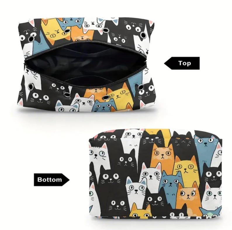 May include: A zippered pouch featuring a repeating pattern of cartoon cats in black, white, orange, and blue. The top view shows the open interior with metal grommets, while the bottom view displays the closed pouch with the same cat print.