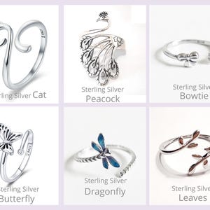May include: A collection of sterling silver rings with various designs. The rings include a cat with pink accents, a peacock, a bowtie, a butterfly, a dragonfly with blue enamel, and leaves. Each ring is displayed on a white background.