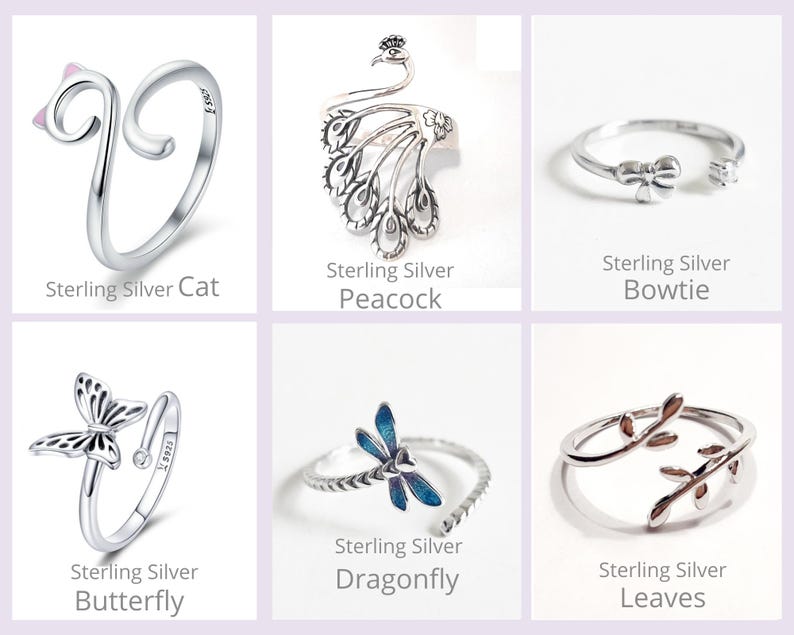 May include: A collection of sterling silver rings with various designs. The rings include a cat with pink accents, a peacock, a bowtie, a butterfly, a dragonfly with blue enamel, and leaves. Each ring is displayed on a white background.