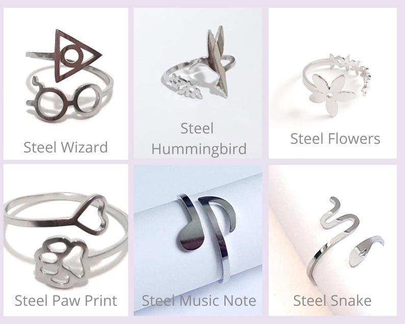May include: A collection of silver-colored steel rings with various designs. The rings include a wizard-themed ring, a hummingbird, flower, paw print, music note, and snake. Each ring has the design name printed below it.