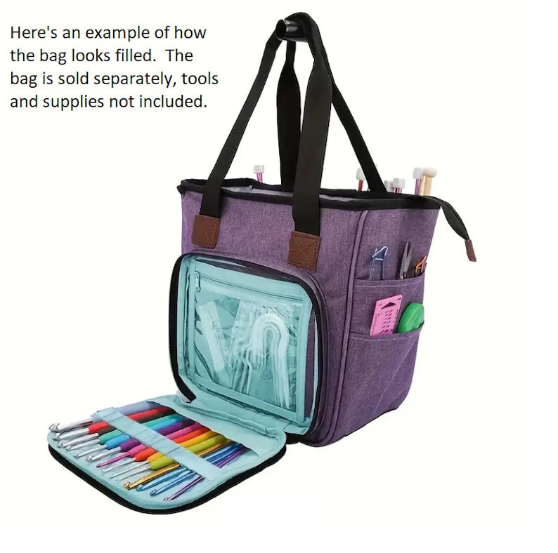 May include: Purple tote bag with multiple pockets and a clear zippered compartment. The bag is open and filled with colorful crochet hooks. The text "Here's an example of how the bag looks filled. The bag is sold separately, tools and supplies not included." is visible.