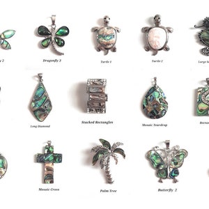 May include: Assortment of 15 silver pendants with abalone shell inlay.  The pendants feature various designs including dragonflies, turtles, seahorses, a palm tree, a cross, a teardrop, a rectangle, a triple oval, a long diamond, stacked rectangles, an open circle, and a butterfly.