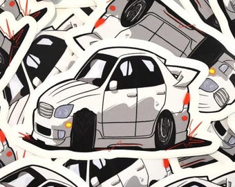 May include: A white car sticker with a white car with black windows and red taillights. The car is on a white background with red and black accents.