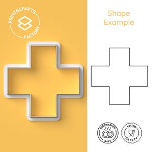 Puede incluir: Un cortador de galletas de plástico blanco en forma de cruz sobre un fondo amarillo. El cortador está al lado de un contorno negro de la misma forma. La imagen también incluye el texto "Shape Example" y las palabras "Dishwasher Safe" y "Food Safety".