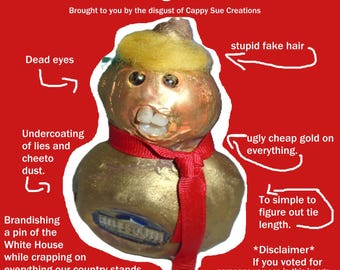 The orange and gold turd president free speech is not dead just yet sculpture