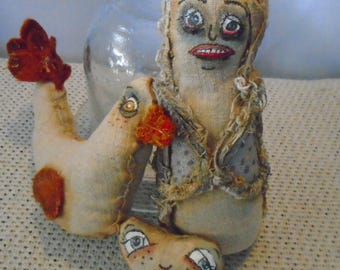 Trio of primitive dolls The good day bad day doll and friends